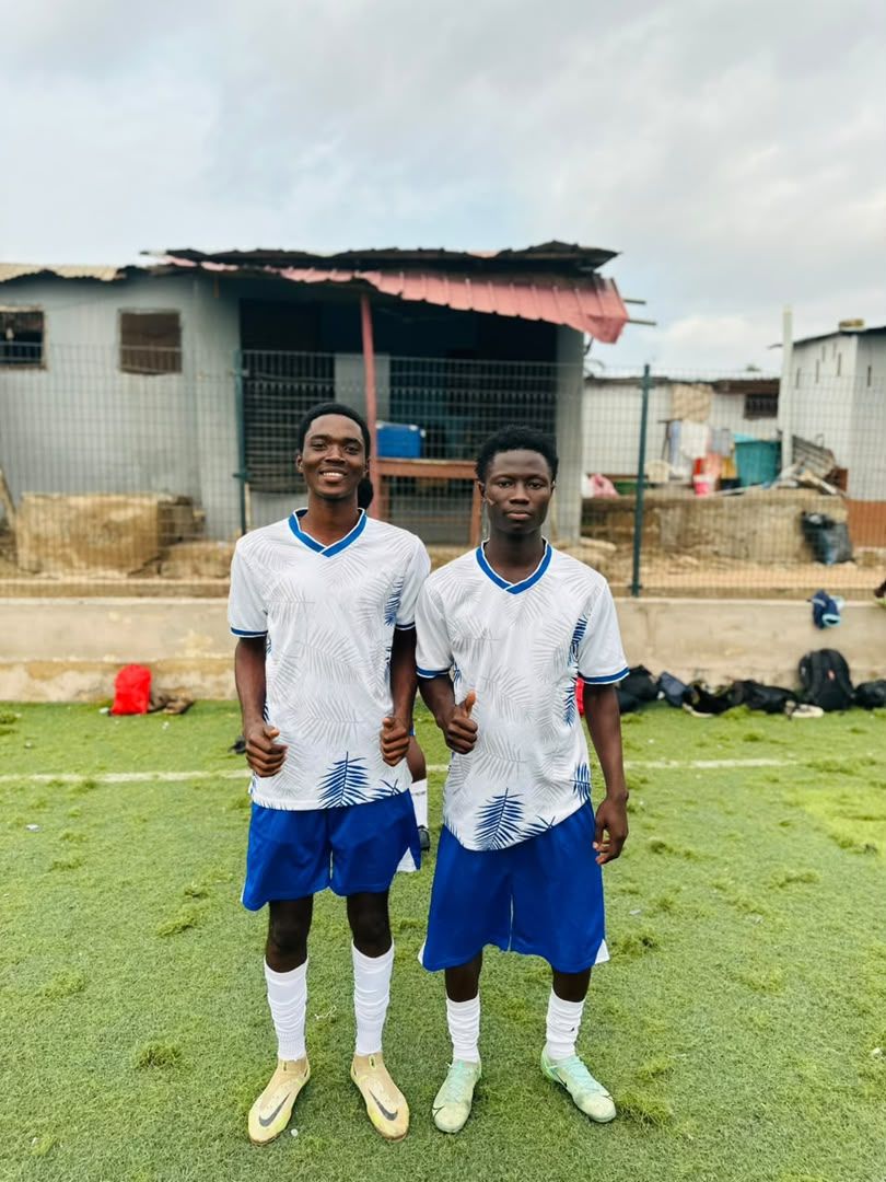 Two players in white and blue kit